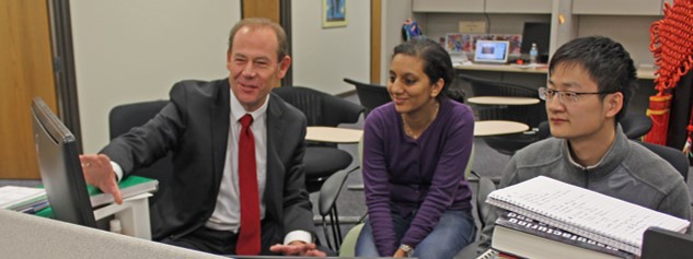 Professor Sutherland collaborating with students 